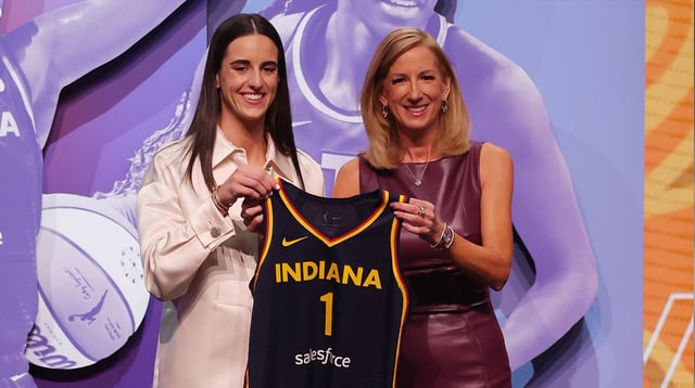 Apr 15, 2024; Brooklyn, NY, USA; Caitlin Clark poses with WNBA commissioner Cathy Engelbert after she is selected with the number one overall pick to the Indiana Fever in the 2024 WNBA Draft at Brooklyn Academy of Music. Mandatory Credit: Brad Penner-Imagn Images.