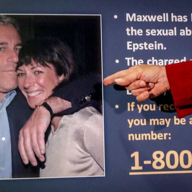 FILE - Audrey Strauss, acting U.S. attorney for the Southern District of New York, points to a photo of Jeffrey Epstein and Ghislaine Maxwell, during a news conference in New York on July 2, 2020. (AP Photo/John Minchillo, File)