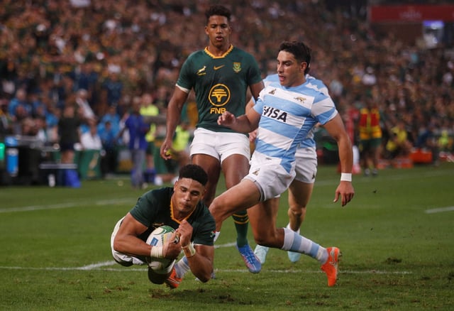 Rugby Union - Rugby Championship - South Africa v Argentina - Kings Park Stadium, Durban, South Africa - September 27, 2025 South Africa's Sacha Feinberg-Mngomezulu scores their second try  REUTERS/Rogan Ward