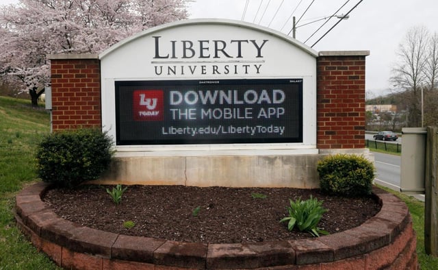 Ellenor Zinski, who was hired by Liberty University as a man named Jonathan, says the school violated the Civil Rights Act. The reply brief filed by Liberty Counsel argues that, as a Christian employer, it is within its rights and cited religious freedom. Liberty is private, evangelical university in Lynchburg, Virginia. (STEVE HELBER/AP FILE)
