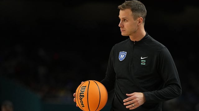 Apr 5, 2025; San Antonio, TX, USA; Duke Blue Devils head coach Jon Scheyer looks on against the Houston Cougars during the second half in the semifinals of the men's Final Four of the 2025 NCAA Tournament at the Alamodome. Mandatory Credit: Bob Donnan-Imagn Images