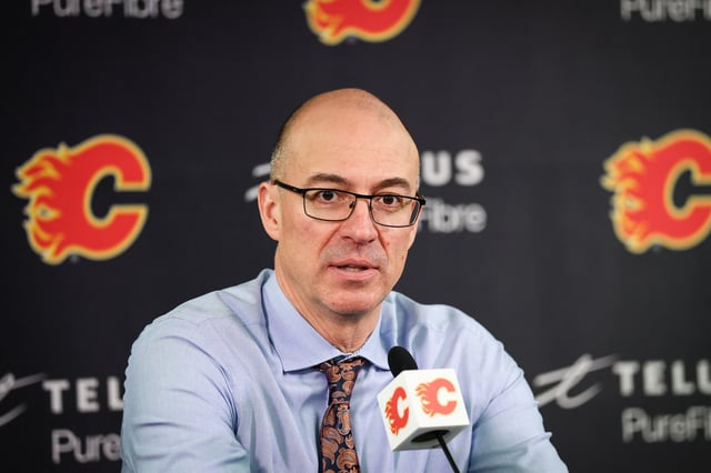Apr 3, 2025; Calgary, Alberta, CAN; Calgary Flames head coach Ryan Huska during interview after the game against the Anaheim Ducks at Scotiabank Saddledome. Mandatory Credit: Sergei Belski-Imagn Images
