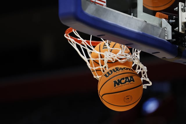 Mar 28, 2024; Detroit, MN, USA; Detailed view of a basketball entering the hoop during NCAA Tournament Midwest Regional-Practice at Little Caesars Arena. Mandatory Credit: Rick Osentoski-USA TODAY Sports/ File Photo
