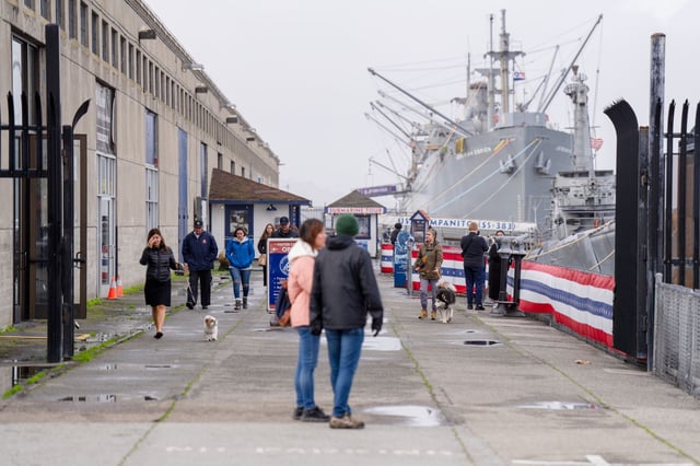 Visitors in Fisherman’s Wharf explore the pier along the SS Jeremiah O’Brien in San Francisco in 2023.