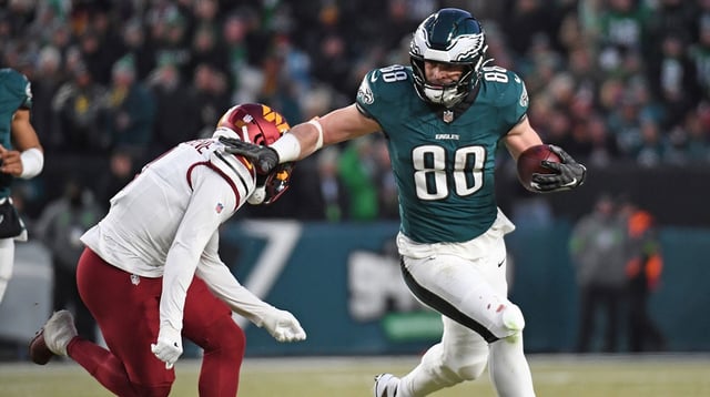 Jan 26, 2025; Philadelphia, PA, USA; Philadelphia Eagles tight end Dallas Goedert (88) tries to get past Washington Commanders cornerback Mike Sainristil (0) in the NFC Championship game at Lincoln Financial Field. Mandatory Credit: Eric Hartline-Imagn Images
