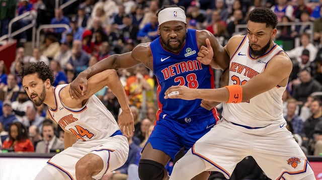 Apr 10, 2025; Detroit, Michigan, USA; Detroit Pistons center Isaiah Stewart (28) battles for position New York Knicks forward Precious Achiuwa (5) and guard Landry Shamet (44) during the second half at Little Caesars Arena. Mandatory Credit: David Reginek-Imagn Images