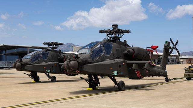 The Australian Army's first two AH-64E Apache helicopters at RAAF Base Townsville. (Caitlyn Davill/Defence)
