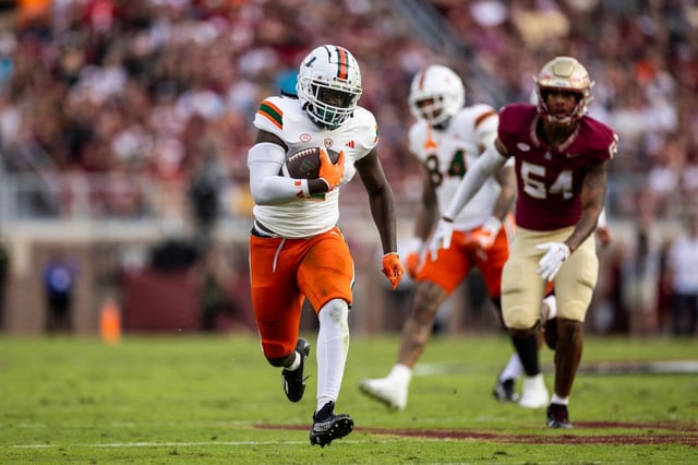 Donald Chaney Jr. #2 of the Miami Hurricanes runs the ball during the first half of a game against the Florida State Seminoles at Doak Campbell Stadium on Nov. 11, 2023 in Tallahassee, Florida. (Photo by James Gilbert/Getty Images)