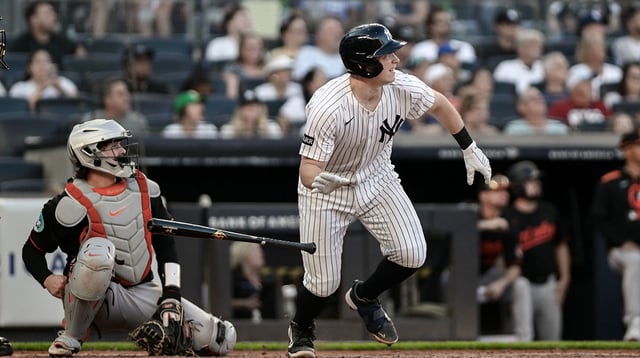 Sep 28, 2025; Bronx, New York, USA; New York Yankees first baseman Ben Rice (22) hits a solo home run against the Baltimore Orioles during the eighth inning at Yankee Stadium. Mandatory Credit: John Jones-Imagn Images