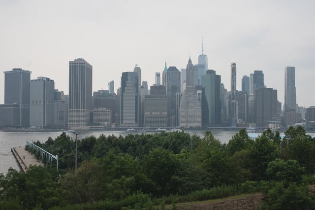 Manhattan skyline is seen through August haze caused by smoke from Canadian wildfires as the conditions continued to impact air quality in New York City, prompting health alerts and reducing visibility across the metropolitan area.
