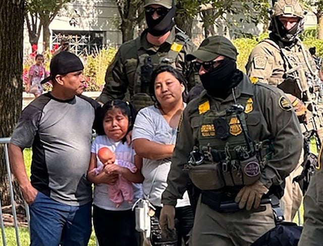 Jaime Ramirez, his daughter Dasha, 8, and wife Noemi Chavez are taken into custody by federal agents near Millennium Park in Chicago on Sept. 28, 2025.  (Lindsay Rich)