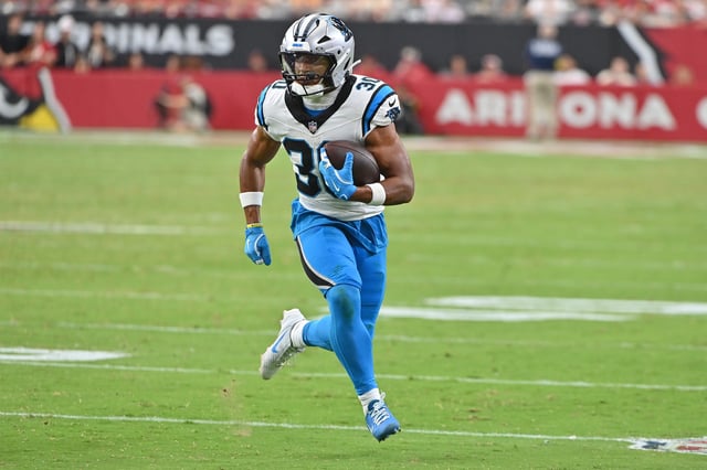 Sep 14, 2025; Glendale, Arizona, USA;  Carolina Panthers running back Chuba Hubbard (30) runs with the ball during the fourth quarter against the Arizona Cardinals at State Farm Stadium. Mandatory Credit: Matt Kartozian-Imagn Images/ File Photo