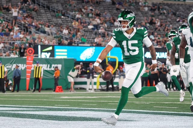 Aug 22, 2025; East Rutherford, New Jersey, USA; New York Jets quarterback Adrian Martinez (15) rushed for a touchdown during the second half against the Philadelphia Eagles at MetLife Stadium. Mandatory Credit: Vincent Carchietta-Imagn Images/ File Photo