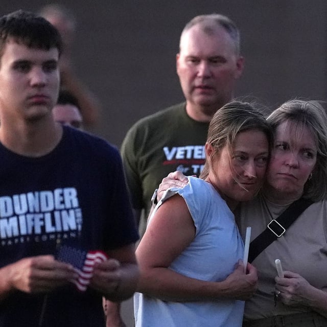 Well-wishers attend a Catholic rosary prayer vigil after Charlie Kirk was shot and killed during a Utah college event Wednesday, Sept. 10, 2025, in Scottsdale, Ariz. (AP Photo/Ross D. Franklin)