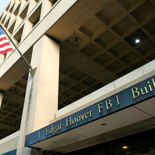 FILE - The FBI's J. Edgar Hoover headquarters building is seen in Washington, Nov. 2, 2016. (AP Photo/Cliff Owen, File)