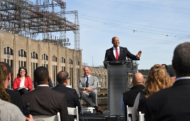 Governor Wes Moore, Congresswoman Sarah Elfreth, left, and Constellation CEO Joe Dominiguez and others announce a $340 million deal with Constellation Energy to help sustain the long-term health of the Chesapeake Bay and to preserve the Conowingo Dam for another 50 years. (Lloyd Fox/Staff)