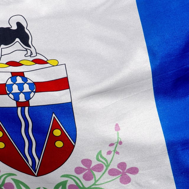 The Yukon flag flies on a flag pole in Ottawa, Monday July 6, 2020. Yukon's acting Chief medical officer, Dr. Catherine Elliott, is introducing more public health measures to limit the spread of COVID-19. THE CANADIAN PRESS/Adrian Wyld