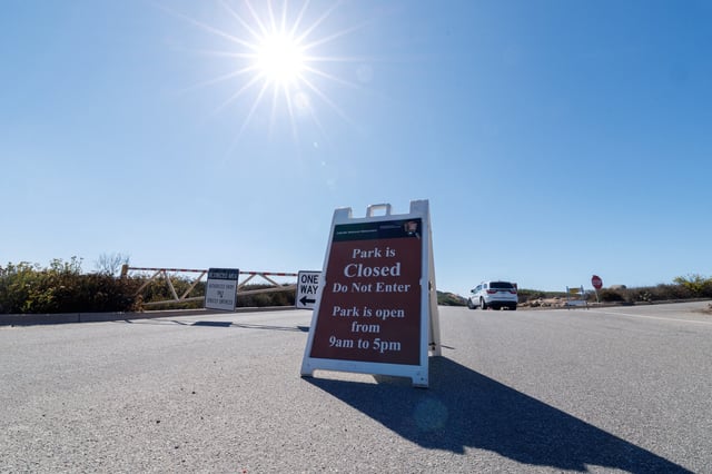 The entrance to Cabrillo National Monument is shown closed during the first day of a partial U.S. government shutdown, in San Diego, California, U.S., October 1, 2025. REUTERS/Mike Blake/File Photo