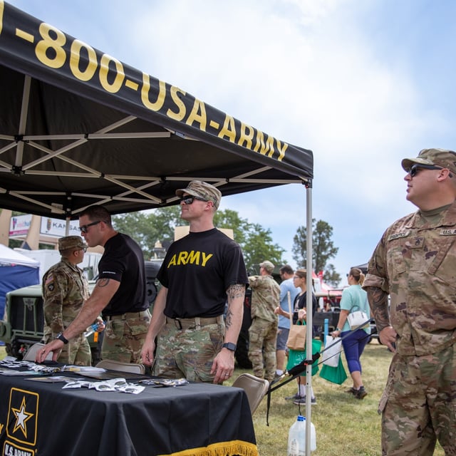 FILE - Army soldiers hosted a recruitment booth in Hutchinson, Kansas, Sept. 9, 2023. (U.S. Army Reserve photo by Pfc. Aiden Griffitts)
