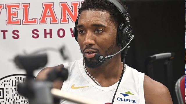 Sep 29, 2025; Cleveland, OH, USA; Cleveland Cavaliers guard Donovan Mitchell (45) talks to a reporter during media day at Rocket Arena. Mandatory Credit: Ken Blaze-Imagn Images