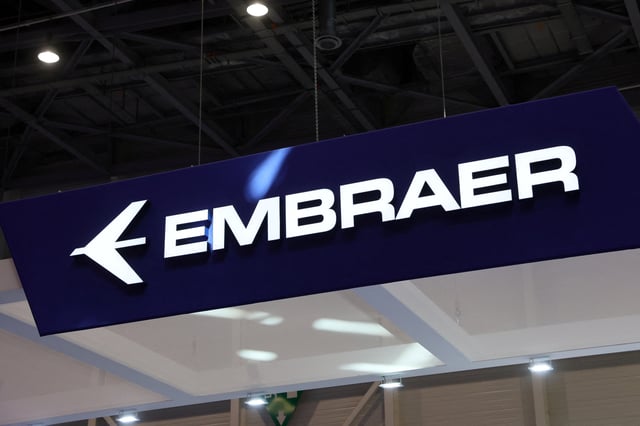 An Embraer logo is pictured during the European Business Aviation Convention & Exhibition (EBACE) in Geneva, Switzerland, May 23, 2022. REUTERS/Denis Balibouse