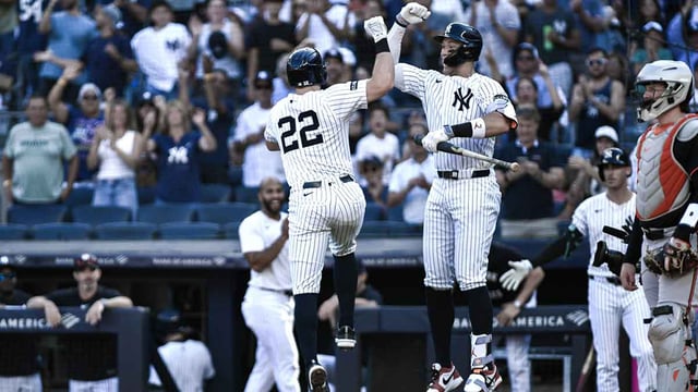 Sep 28, 2025; Bronx, New York, USA; New York Yankees first baseman Ben Rice (22) celebrates at home plate with outfielder Aaron Judge (99) after hitting a solo home run against the Baltimore Orioles during the first inning at Yankee Stadium. Mandatory Credit: John Jones-Imagn Images.