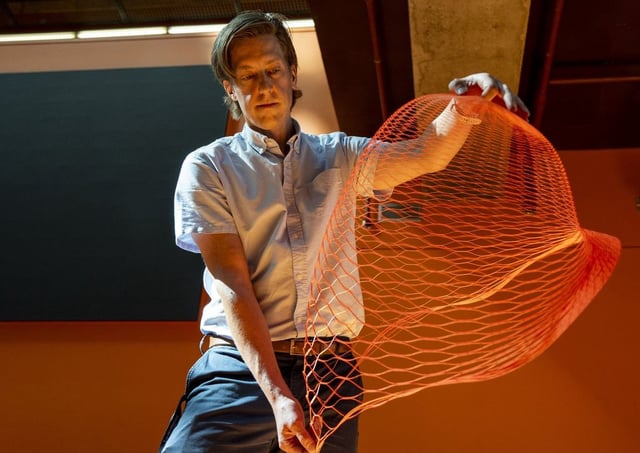 Frédérick Gosselin, professor at Polytechnique Montréal’s demonstrates the elasticity of a parachute in Montreal. 