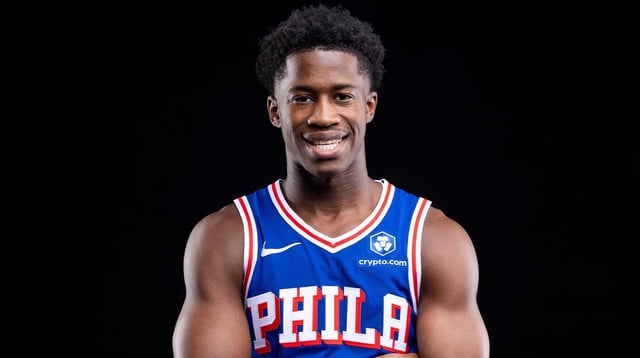 Sep 26, 2025; Camden, NJ, USA; Philadelphia 76ers VJ Edgecombe (77) poses for a photo during media day. Mandatory Credit: Bill Streicher-Imagn Images
