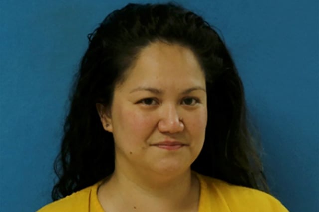 Elizabeth Wolf, accused of the attempted drowning of a 3-year-old Palestinian-American Muslim girl, poses for an undated police booking photograph in the Dallas suburb of Euless, Texas, U.S.   Euless Police Department/Handout via REUTERS