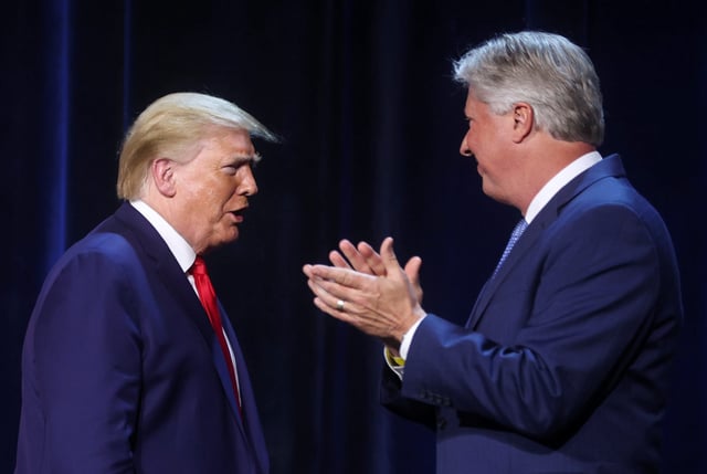 U.S. President Donald Trump is greeted by Pastor Robert Morris as he arrives for a roundtable discussion with members of the faith community, law enforcement and small business at Gateway Church Dallas Campus in Dallas, Texas, U.S., June 11, 2020.