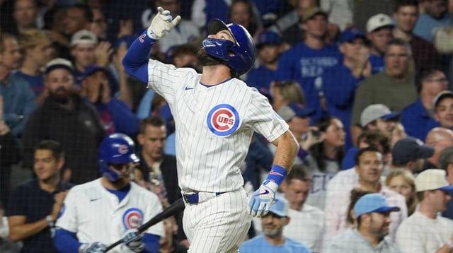 Sep 25, 2025; Chicago, Illinois, USA; Chicago Cubs shortstop Dansby Swanson (7) gestures after hitting a home run against the New York Mets during the fifth inning at Wrigley Field. Mandatory Credit: David Banks-Imagn Images.