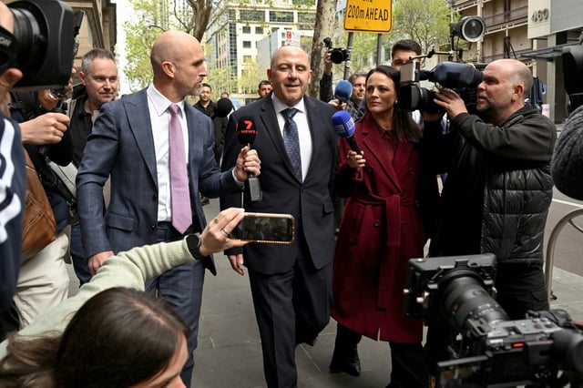 Melbourne gangland personality Tony Mokbel (C) arrives at the Victorian Court of Appeal in Melbourne on October 3, 2025