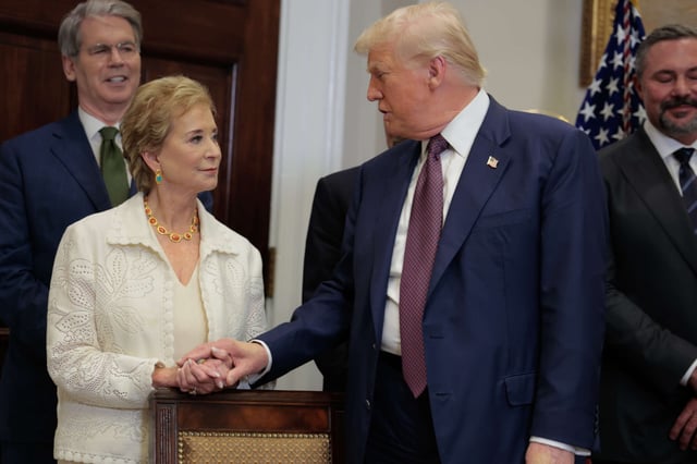 U.S. President Donald Trump speaks with Secretary of Education Linda McMahon during an executive order signing ceremony in the Roosevelt Room of the White House on July 31, 2025, in Washington, D.C.
