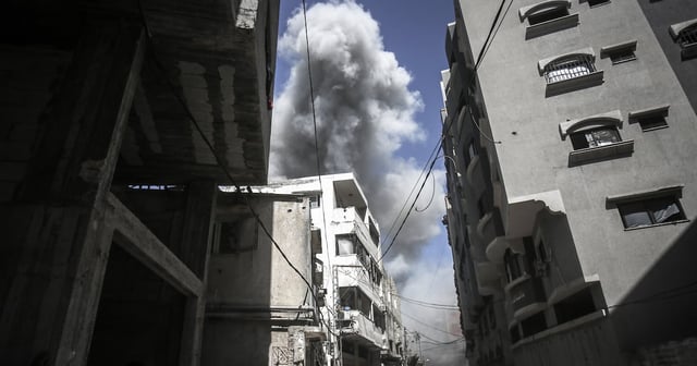The aftermath of an Israeli air strike as troops push deeper into Gaza city. Bloomberg