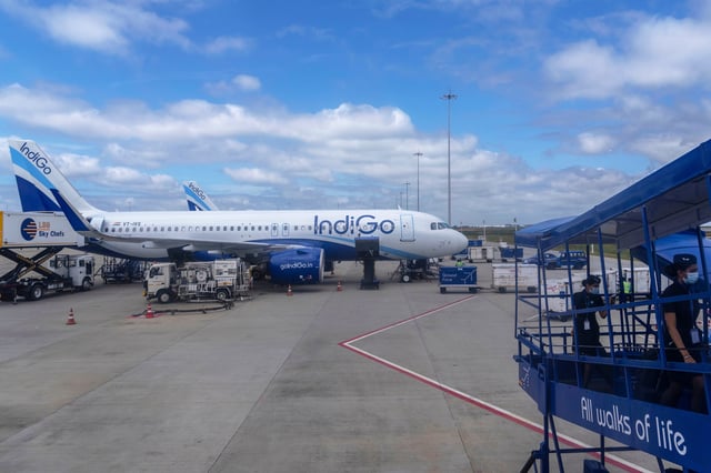 FILE - An aircraft of India's budget airline IndiGo is serviced at Kempegowda International Airport in Bangalore, India, Sept. 16, 2022. (AP Photo/Rafiq Maqbool, File)