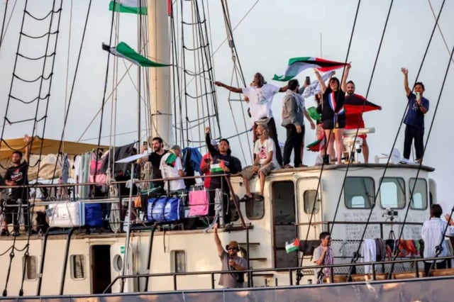Activists and human rights defenders on board a vessel departing from Tunisia's northern port of Bizerte on September 14, 2025, as part of the Global Sumud Flotilla, bound for the Gaza Strip [AFP]