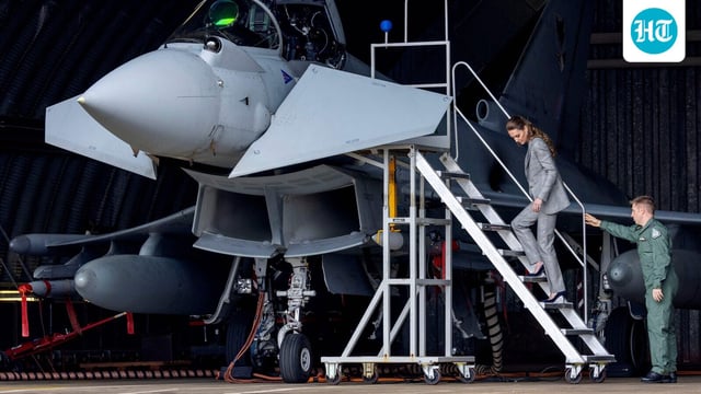 Kate Middleton stepping off a fighter jet in her stilettos. 