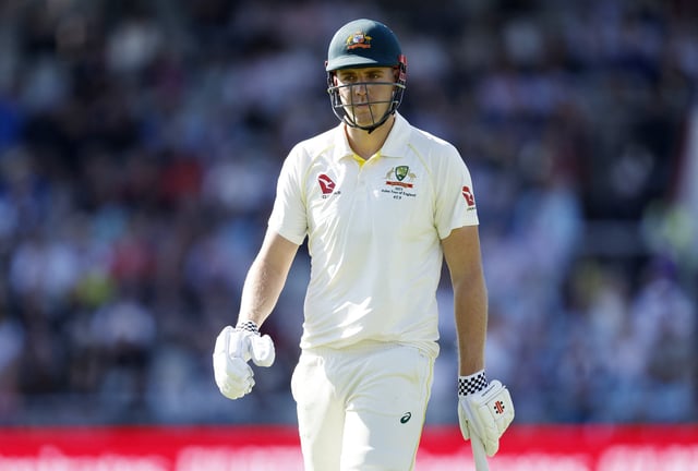 Cricket - Ashes - Fourth Test - England v Australia - Old Trafford Cricket Ground, Manchester, Britain - July 19, 2023 Australia's Cameron Green walks after losing his wicket, lbw off the bowling of Chris Woakes Action Images via Reuters/Jason Cairnduff