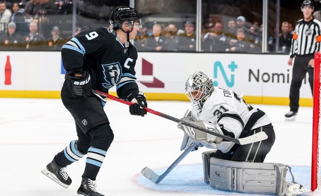 Utah Mammoth right wing Clayton Keller (9) has his shot blocked by Los Angeles Kings goaltender Anton Forsberg (31) during a shootout after an NHL preseason game at the Delta Center in Salt Lake City on Thursday, Oct. 2, 2025.