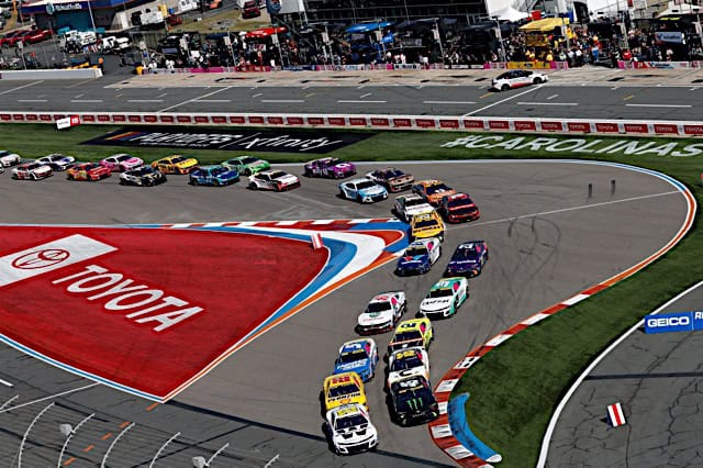 NASCAR Cup Series Charlotte ROVAL- general view of cars pack racing on the frontstretch chicane