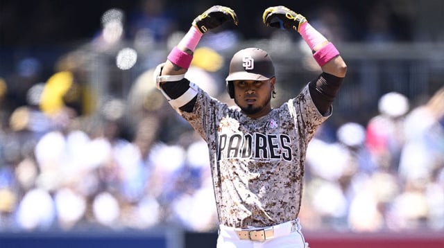 May 12, 2024; San Diego, California, USA; San Diego Padres designated hitter Luis Arraez (4) celebrates after hitting a double against the Los Angeles Dodgers during the second inning at Petco Park. Mandatory Credit: Orlando Ramirez-USA TODAY Sports