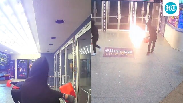 Film.ca cinemas said two masked suspect carrying red gas cans set fire to the entrance doors of the theatre.