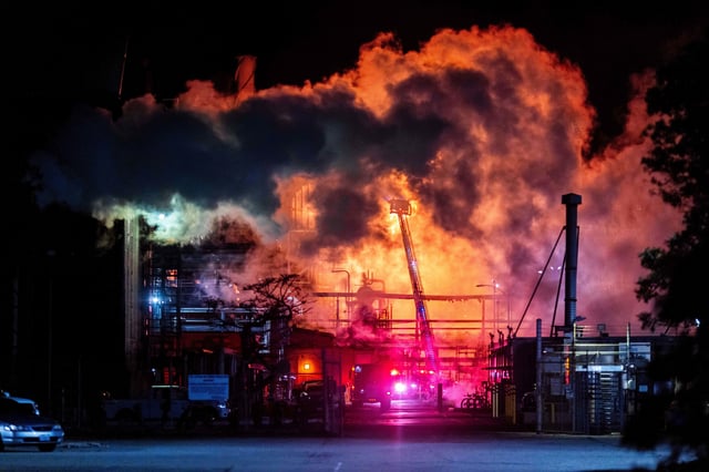Flames rise from the Chevron refinery in El Segundo, California, on Thursday.
