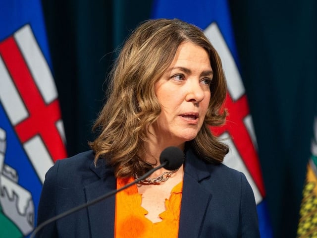Premier Danielle Smith speaks to media in Calgary on Tuesday, Sept. 30, 2025 regarding a looming teacher's strike.