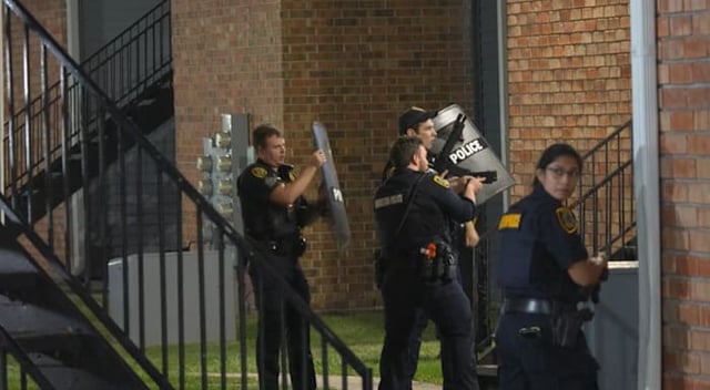 Houston police at the scene of a deadly shooting early Friday on Plaza Verde Drive.