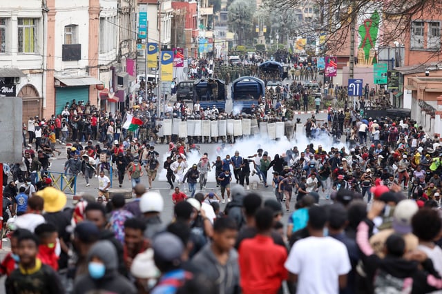 Demonstrators protesting against chronic electricity and water cuts confront riot police in Antananarivo, Madagascar, September. 30, 2025.