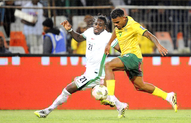 Bafana Bafana's Lyle Brent Foster and Calvin Chinedu Bassey of Nigeria during their 2026 Fifa World Cup qualifier on 9 September 2025 in Bloemfontein, South Africa. (Photo: Charlé Lombard / Gallo Images)