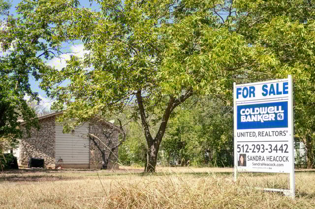 A Coldwell Banker real-estate property is seen for sale on September 22, 2025, in Austin, Texas. (Brandon Bell/Getty Images)