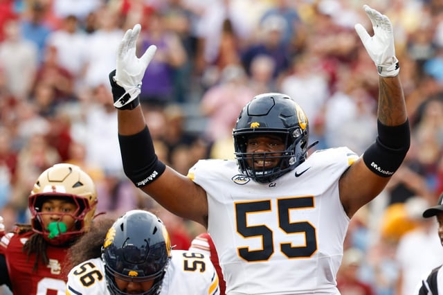 California offensive lineman Leon Bell (55) reacts after a touchdown during the first half of an NCAA football game against Boston College on Saturday, Sept. 27, 2025, in Chestnut Hill, Mass. (AP Photo/Greg M. Cooper)