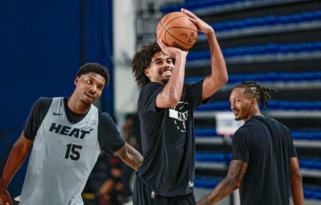 Miami Heat guard Ethan Thompson attempts a basket during camp drills at Florida Atlantic University in Boca Raton, Florida, on Thursday, October 2, 2025. (Al Diaz/Miami Herald)